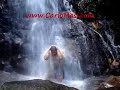 Carlo Masi showering in a waterfall Carlo Masi showering in a waterfall