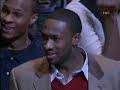 Andre Iguodala behind the glass from AI to reverse dunk