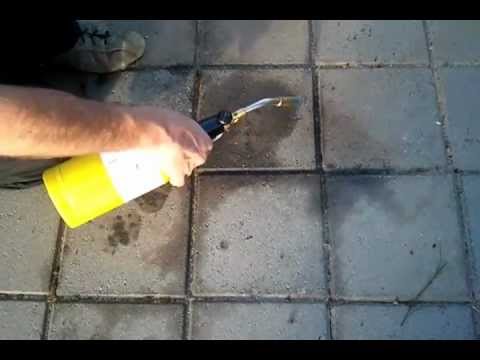 how to clean oil leak on driveway