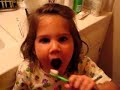 How a child should brush her teeth. How a child should brush her teeth.