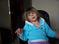 Eryn spinning in the office chair singing boat baby (which she made up to the tune of right round baby right round)