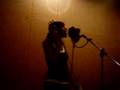Kavina laying vocals