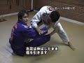 One of the Mendes brothers demonstrating how to go from De La Riva guard to back mount
