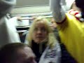 Liverpool fans singing Fernando Torres song on tram on way back to Duomo from San Siro. It also has the man in the pink hat. At about 13 seconds you get a glimpse of him in a white/cream jacket.Bounce!