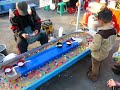 boy fishing pearls