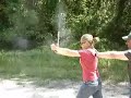 Chick almost shoots herself!!!