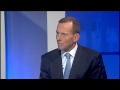 Abbott defends spending cuts