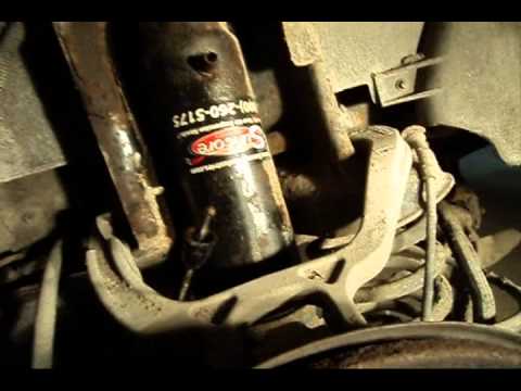 1994 Cadillac Deville: Shock Absorber Removal