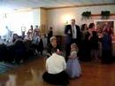 Mike puts the garter on Aunt Betty