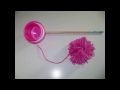 Manualidades de Reciclaje:   juego de mete el pompon en el vaso con una tapa de detergente