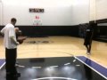 Kings assistant Pete Carril works with rookie Tyreke Evans