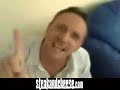 Guy playing guitar and singing