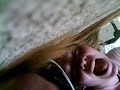 hanging upside down off my bed