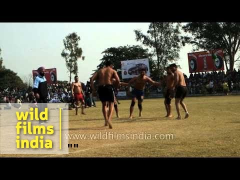 Men play a game of kabaddi - Rural Olympics