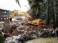 Excavator at Culvert Construction.