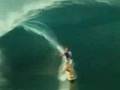 LAIRD HAMILTON SURFING TEAHUPOO