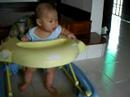 Adam Yoong Hanifah in baby walker at 4 months