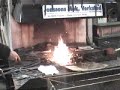 Mats Jonsson forging a tong