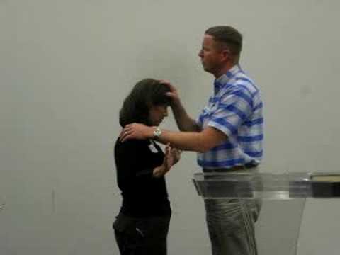 Pastor Philip blesses Aries