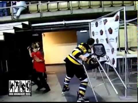 Hockey Player Fights then Smashes His Helmet and Throws a Chair