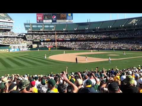 AL West - The Oakland Athletics get the last three outs of the game to win the American League West against the Texas Rangers, Oct 3, 2012.