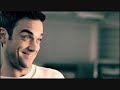 Bekijk muziek clip van Robbie Williams met Elastik