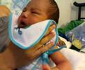 making a baby burp, the Aussie way. making a baby burp, the Aussie way.