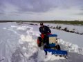 gutbrod met sneeuw schuiver