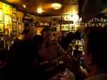 Irish men singing in pub