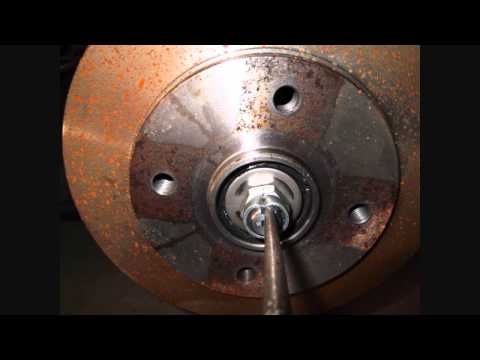 01 to 02 KIA Rio rear wheel bearing adjustment