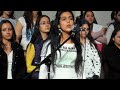 The Gandhi School Choir singing the...
