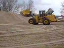 John Deere 824J loader working in a sand plant