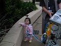 Katalina is walking on her own for flowers.