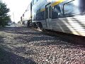 RARE! A MUST SEE! BNSF #5506 LEADS N/B 4HRS. LATE AMTRAK #713 WITH AMTRAK #715 ARRIVING INTO MERCED!