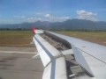 Airasia Landing at Minangkabau International Airport, Indonesia