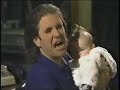 Allan Havey talks to a baby