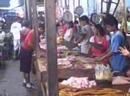 Meat stands in the Belen market (including pig heads, cow stomachs, unidentified parts of unidentified animals, and women fliciking flies off various pieces. It smelled unlovely.)
