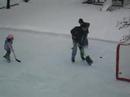 Family on Hockey Rink