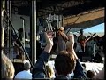 mary chapin carpenter and her band perform in newport, ri - august, 1993.  her band is john jennings, j.t. brown, jon carroll, and robbie macgruder (you can't see robbie in this - he is at the right side of the stage).

the sound is distorted because the camera is quite close to the stage-right speaker stack, and the camera does some wild wanderings.