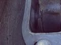 Warning: Language. ***Click 'More Info'***Here's a video I recorded some time in 2005-ish with my good buddy, Richie. I used a throwaway Logitech 4000 webcam, lots of duct tape (...like 2 yards), and a laptop.You are looking at a failed driver side Rear Trailing Arm Bushing (RTAB) of a 1998 BMW 323is (E36 chassis). The bottom of the video frame is the front of the car, the top is the rear. Notice how the trailing arm (the thing that's moving in the video) is able to wobble about as it mushes around inside the RTA console as the rear wheel undergoes loading forces. This is a perfect example of:A) A failed RTA Bushing.B) Why you should install RTAB limiters to prevent this kind of behavior, and double (AT LEAST!) the life of your bushings.When the Rear Trailing Arm (RTA) moves left to right, the rear toe for that wheel is changing. If both left and right bushings are torn, you get toe out under acceleration, toe in during hard braking, and RANDOM toe whenever the wheel feels like it. This is bad. My car was crab-walking all over the place because of this bushing. I was having the 'rear steering' effect. When the car is under hard acceleration, the arm is allowed to move towards the front of the car (down,in reference to the video frame). Under hard braking, the arm moves backwards (up in reference to the video frame). Up and down (in and out in reference to the video frame) and rotational motion occurs when the wheel travels up and down over bumps. The bushing is there to absorb road vibrations and isolate the car body from the wheel. It's NOT there to allow the suspension geometry and alignment to change on the fly (as mine is in the video)What I did in the video: Accelerate from a standstill through 1st gear, into 2nd, and then cycled full on and full off of the throttle 4 times, then drove at about 55 mph on some country roads (see video statistics link for google maps location). I then swerved left and right about 7-8 times at the end of the video, you can see how the arm reacts to slow suspension travel.Dialog: talking about how awful the bushing is, then about how my passenger window seal is broken and you have to open the door so the window seals. I tried to repair it with rubber cement and it looked melted - and failed. A cop drives past, we cuss a lot, and I don't care if you find that offensive, get over it.