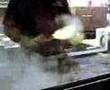 Making cheesesteaks at Rick's Steaks Reading Terminal Market