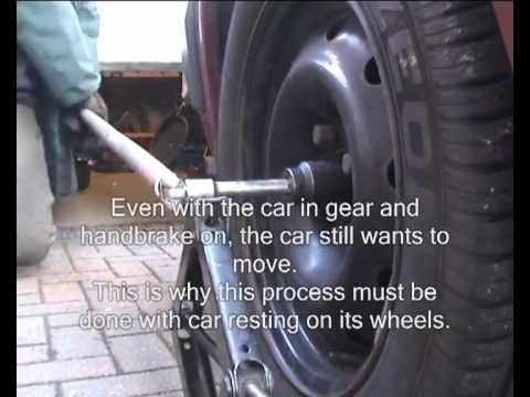 how to remove drive axle hub nut
