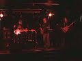 alec playing lead guitar with the paul barker band playing 