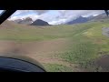 Cessna 185 landing in the Skolai River Valley, Wrangell St. Elias, NP Cessna 185 landing in the Skolai River Valley, Wrangell St. Elias, NP