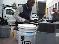 Bucket Man Larry Hunt plays BUCKORENE in San Francisco