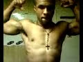 Aaron Brown of www.riversgym.com flexes for the coach