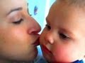 HOT CHICK KISSES CUTE BABY!