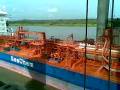 Navio cruzando a ponte do Guaíba