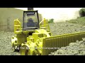 Compacting A New Road And Clearing The Burn Pile