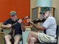 dwight diller and dave bing at a workshop at the 2007 wv folk festival in glenville.  bit of a role reversal here.
